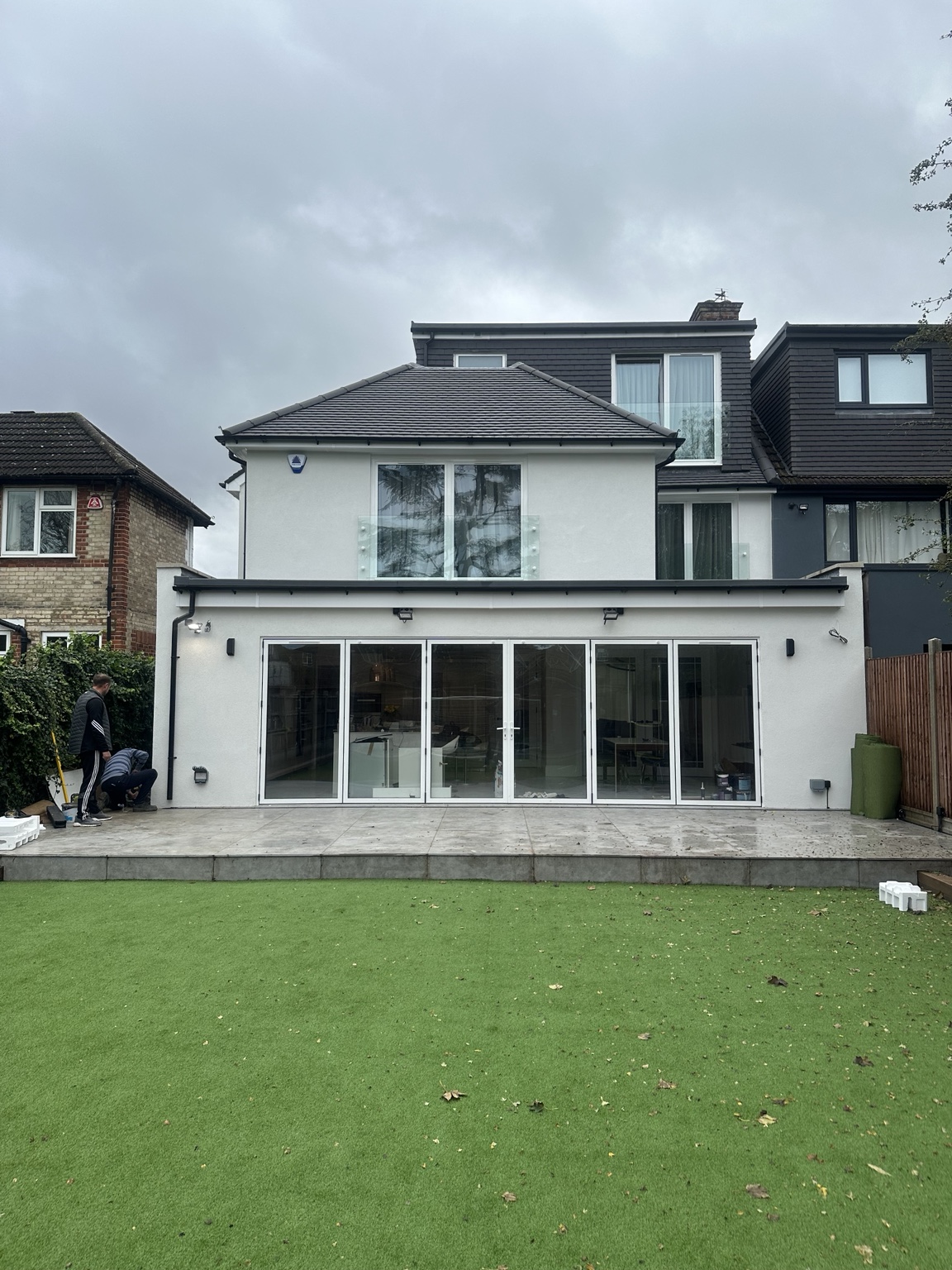 Completed rendered rear extension and loft conversion